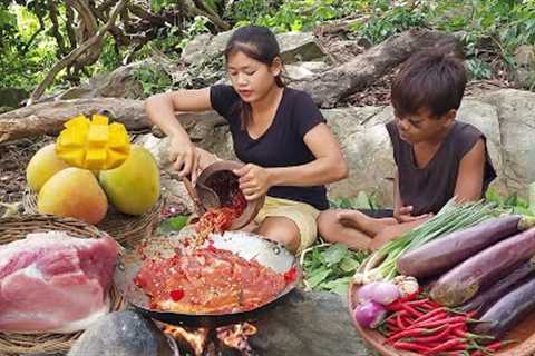 Ripe mango and Pork spicy braised with eggplant for food - Cooking and Eating delicious in jungle