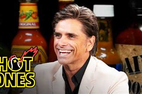 John Stamos Falls Out of His Chair While Eating Spicy Wings | Hot Ones