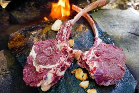 VERY JUICY AND DELICIOUS RIBEYE STEAK COOKED ON A ROCK | PERFECT TOMAHAWK STEAK IN THE WOODS
